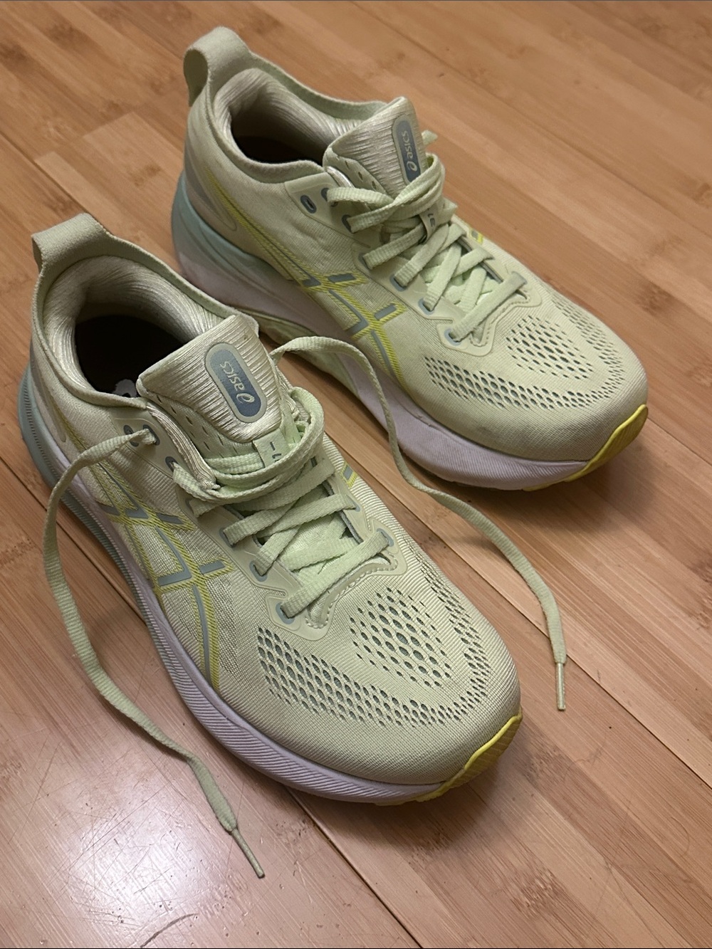 ASICS Women's Pale Green Athletic Running Shoes with Yellow Accents